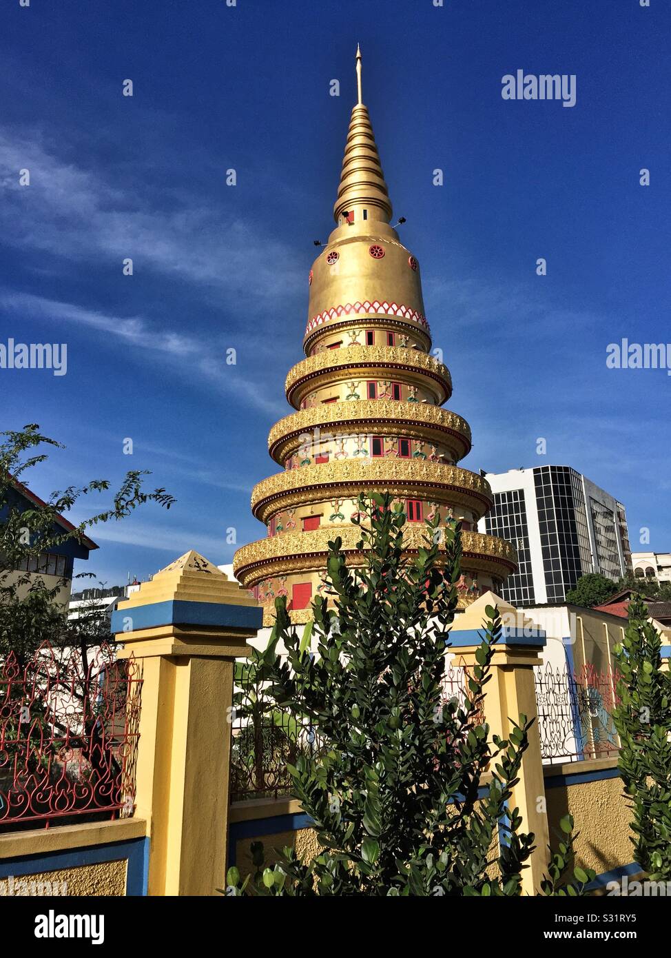Blue sky over a buddhist temple in burma road penang. - Smartphone Captured Stock Image