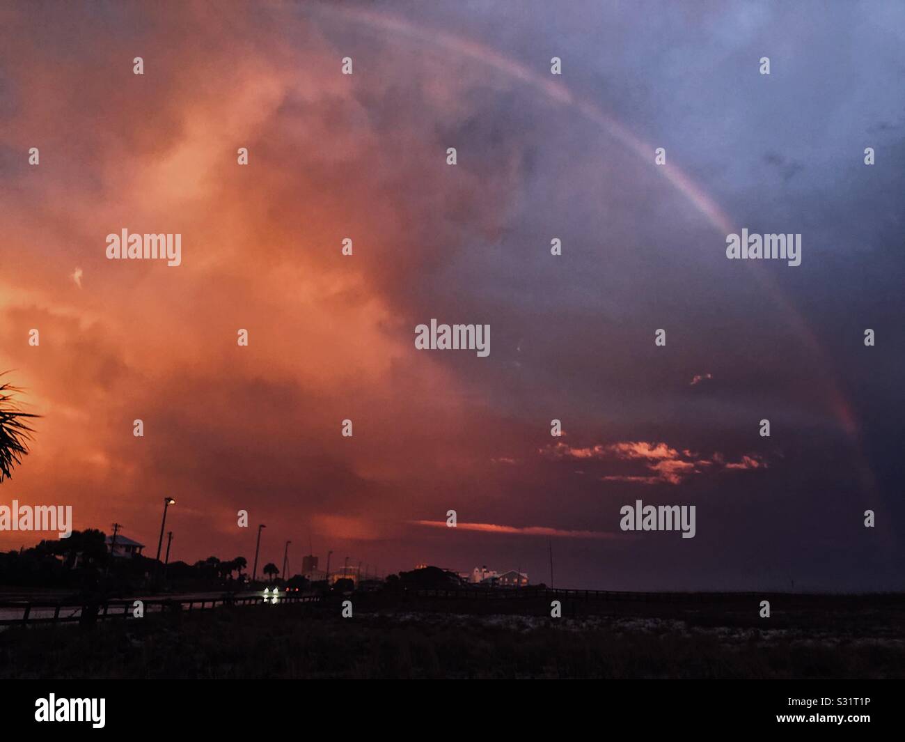 Rainbow with clouds hi-res stock photography and images - Alamy
