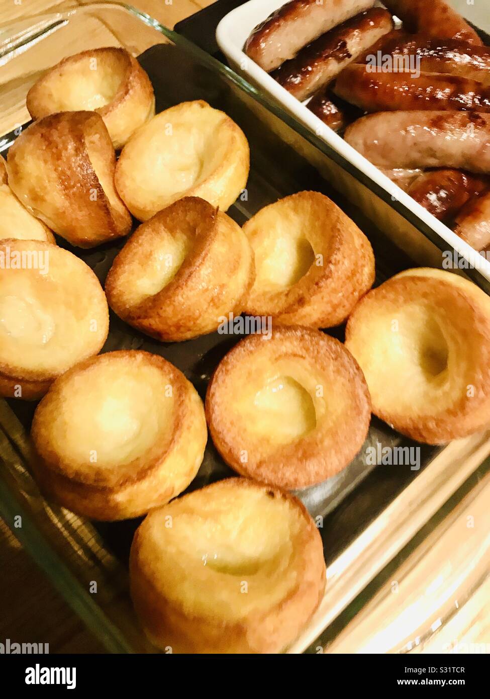 Yorkshire puddings and sausages Stock Photo Alamy