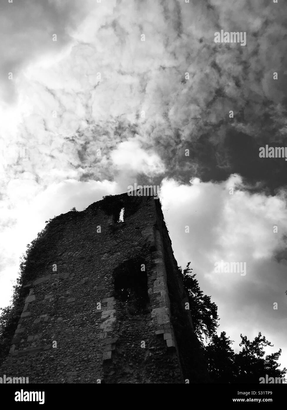 Bishop’s Waltham Palace ruins. Dramatic cloudscape. Black and white photograph. - Smartphone Captured Stock Image