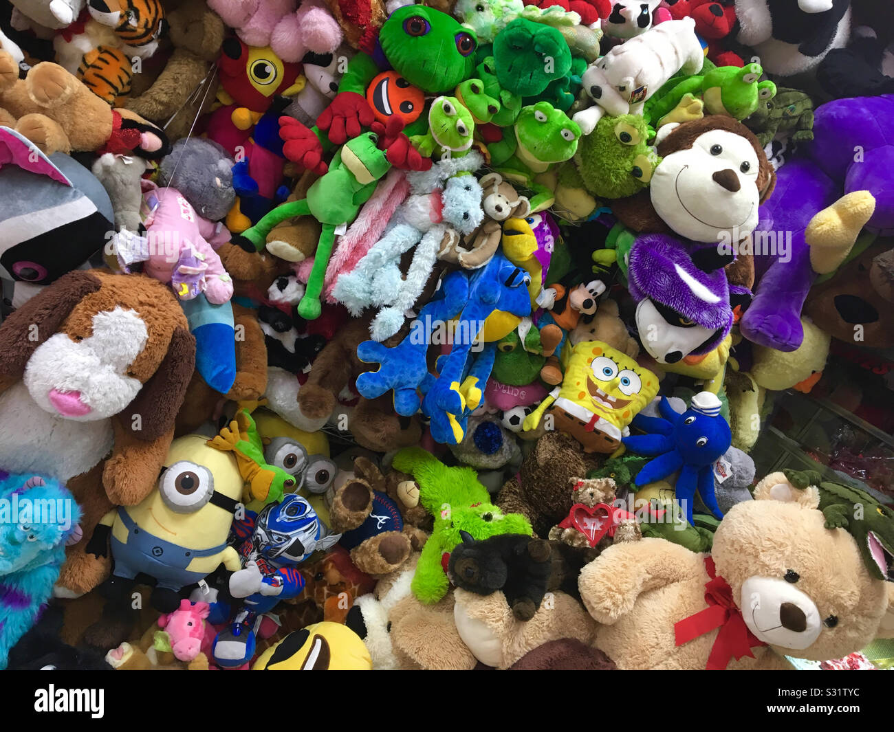https://c8.alamy.com/comp/S31TYC/collection-of-various-stuffed-animals-and-characters-on-display-S31TYC.jpg