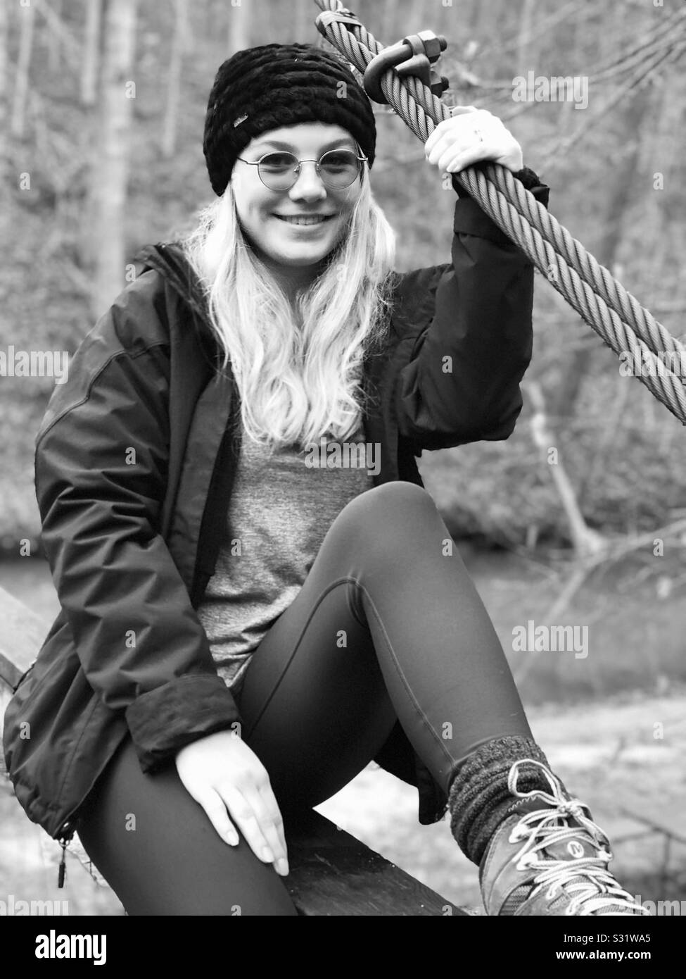 Vintage cowboy boots, hat and rope on an old handmade bench on an old ranch  in New Jersey, USA, farm Stock Photo - Alamy