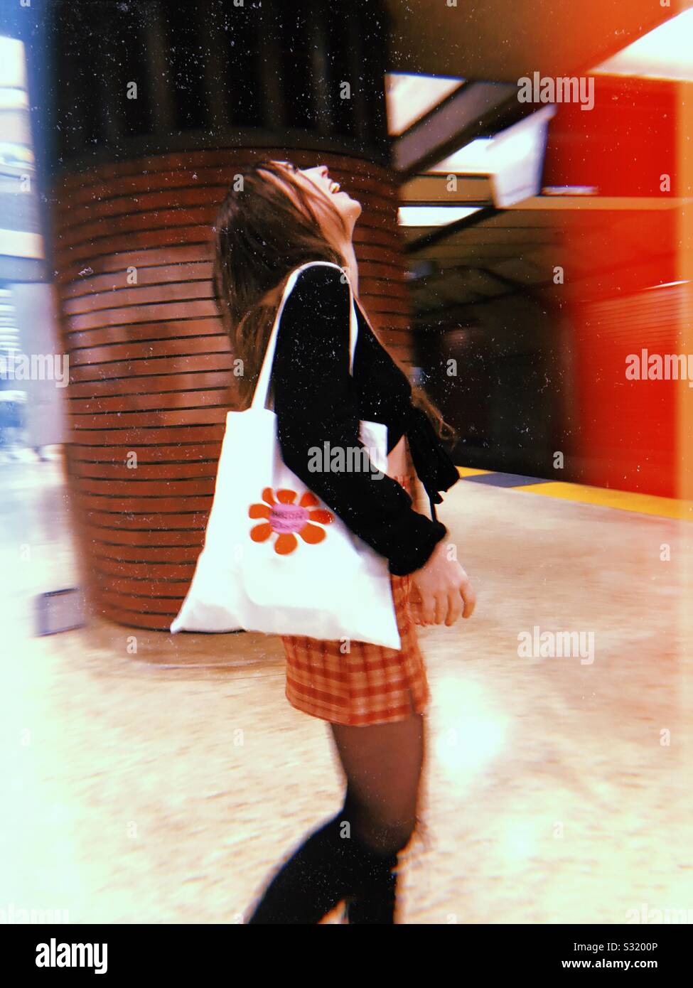 Looking up the skirts in subway