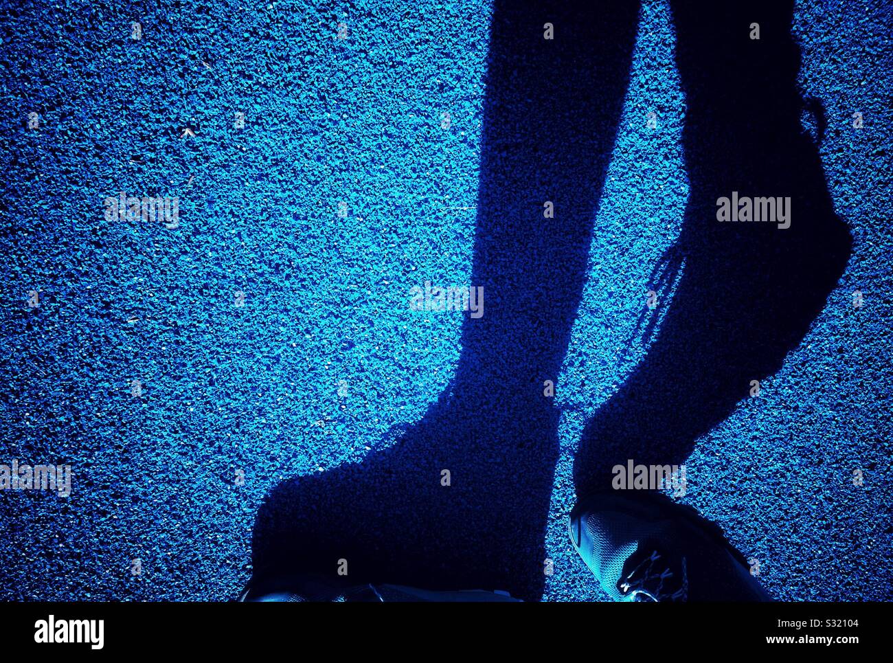 Shadow of feet walking on the street in Barcelona - Smartphone Captured Stock Image