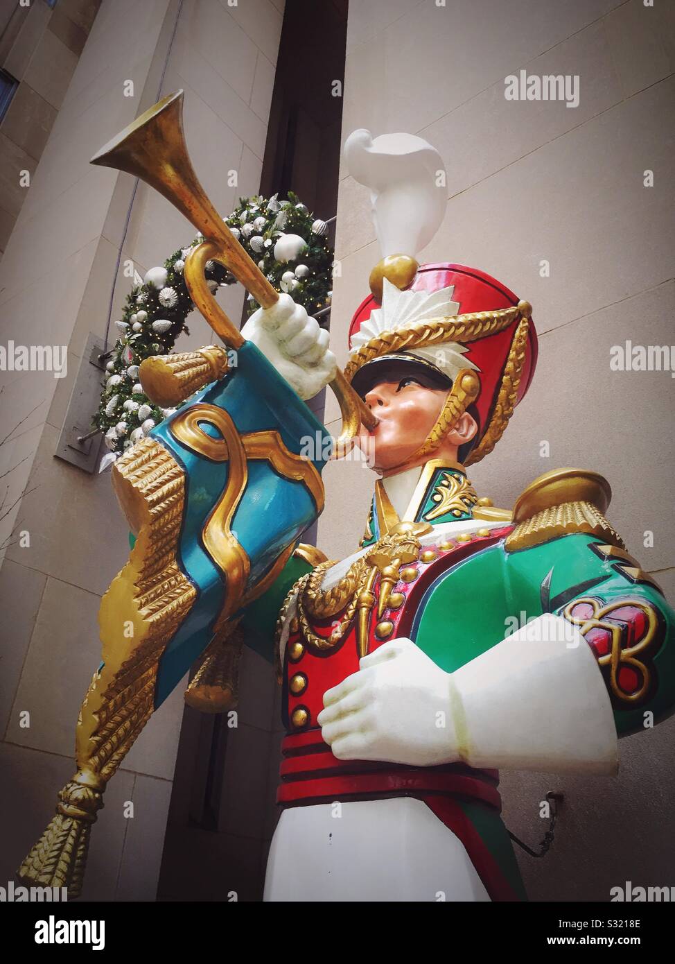 Giant toy soldier decoration in Rockefeller Center during the Christmas holidays, NYC, USA - Smartphone Captured Stock Image