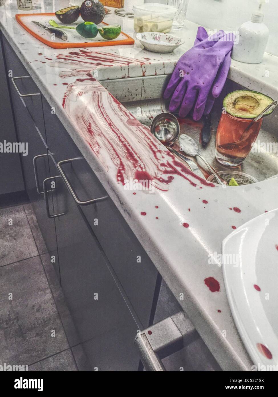 Kitchen is a bloody mess after a knife accident, - Smartphone Captured Stock Image