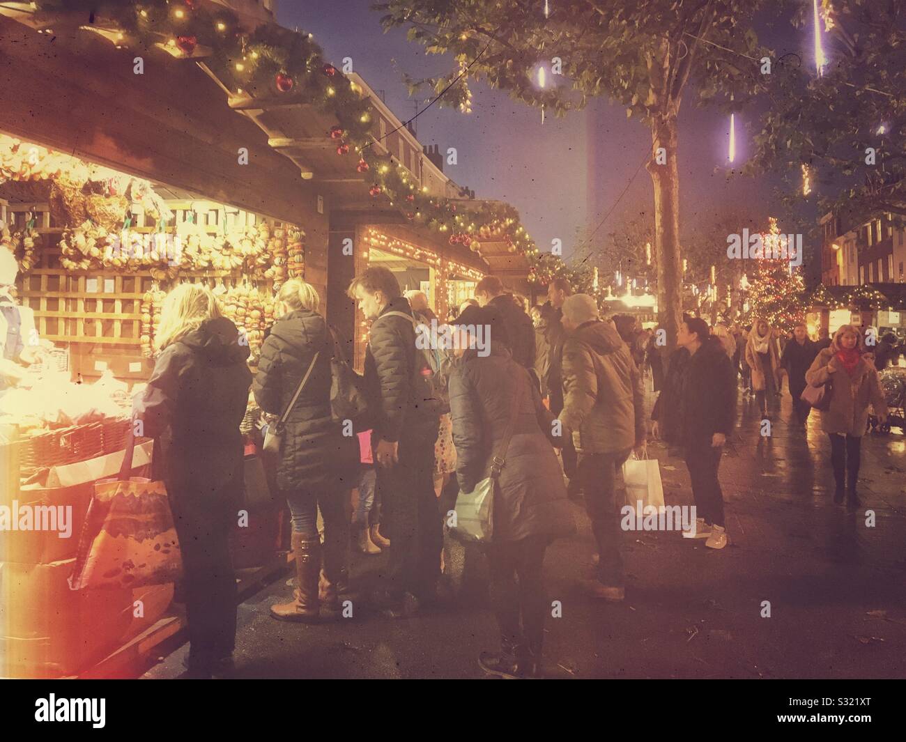 People tourists visitors at the Christmas Market York North Yorkshire England UK United Kingdom GB Great Britain - Smartphone Captured Stock Image