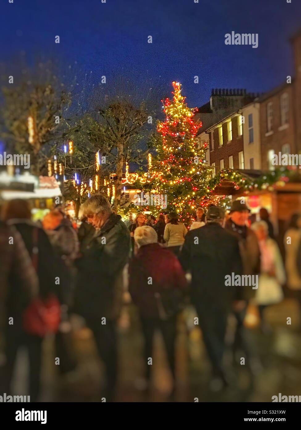People tourists visitors at the Christmas Market York North Yorkshire England UK United Kingdom GB Great Britain - Smartphone Captured Stock Image