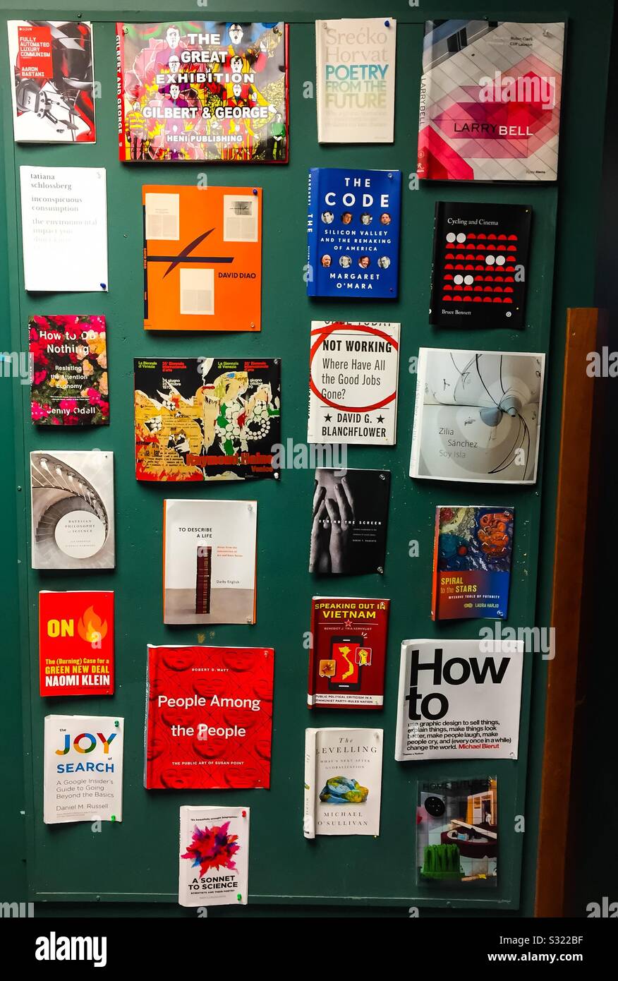 New Books added to the library. Jackets on display on the new additions board, EnglishCanada - Smartphone Captured Stock Image