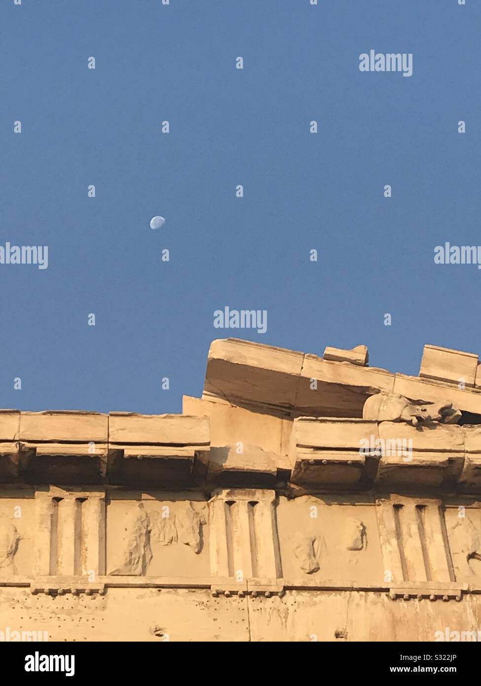 Parthenon pediment with moon - Smartphone Captured Stock Image