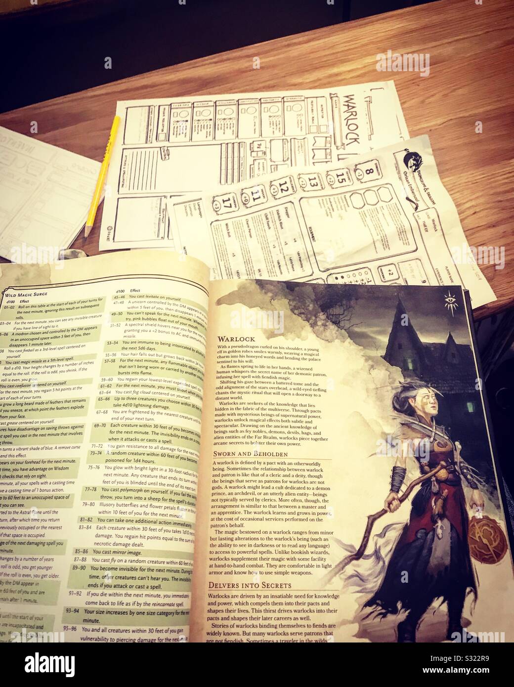 Dungeons and dragons book and character sheets Stock Photo