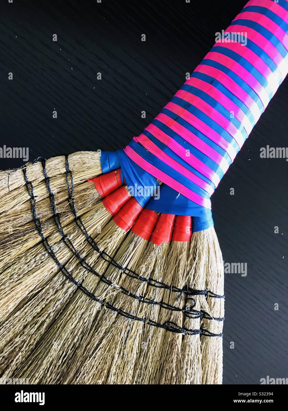 Colourful bright new broom stick, ready to use Swept cleaning product