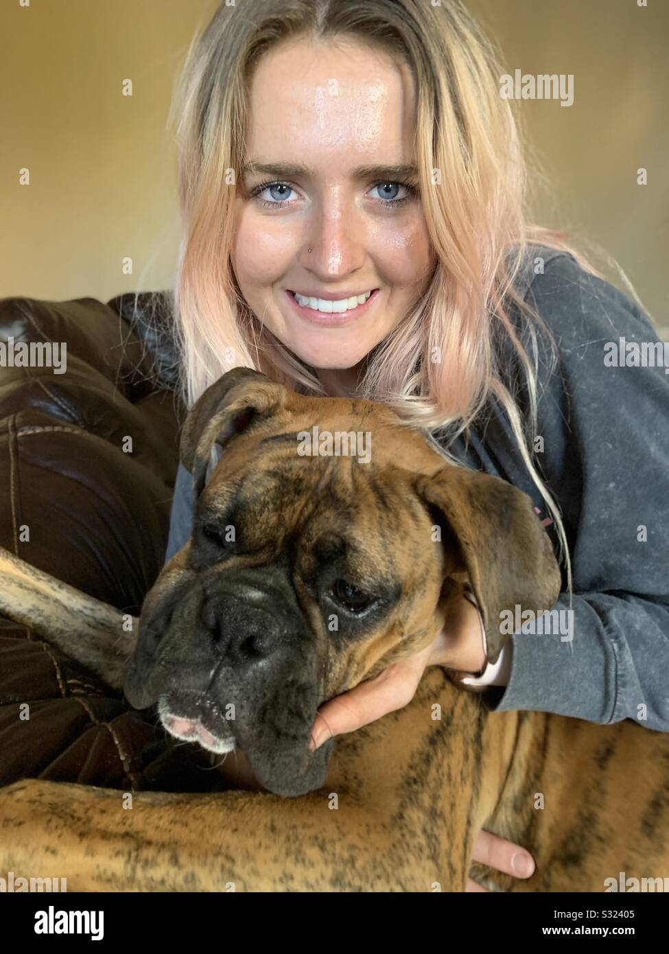 Girl and her boxer puppy dog Stock Photo Alamy