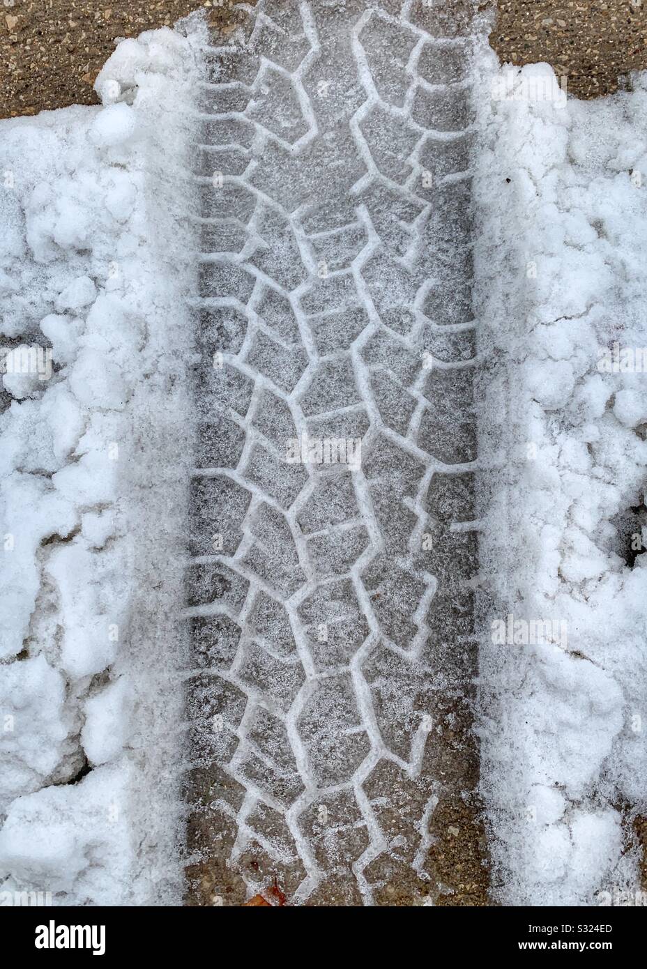Dubuque, Iowa, 01/15/20Closeup photo of tire tread mark imprinted in