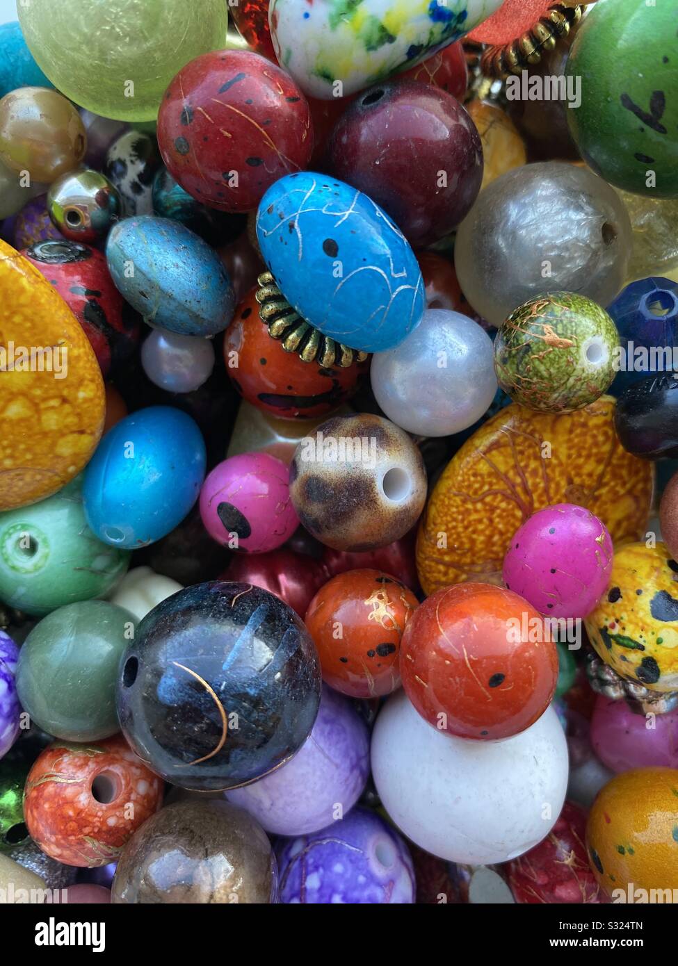 Colourful wooden craft beads pattern Stock Photo - Alamy