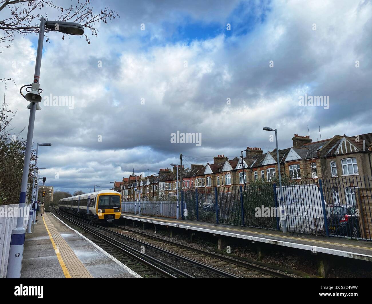 A South Eastern train approaches the platform at Catford Bridge station