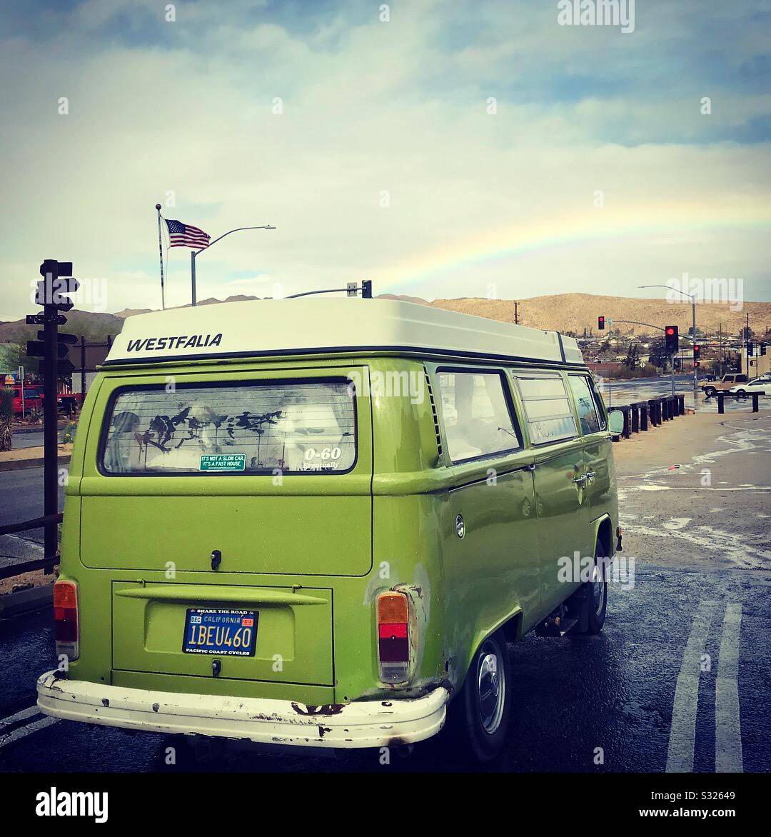 VW Bus campervan with rainbow Stock Photo - Alamy