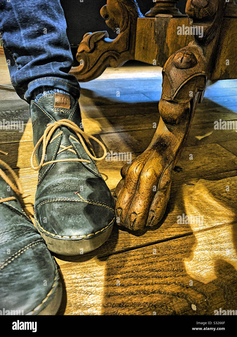 Under the table. - Smartphone Captured Stock Image