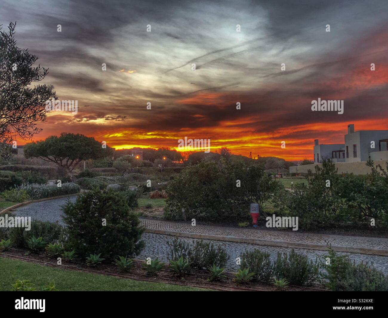 Sunset over a residential street - Smartphone Captured Stock Image