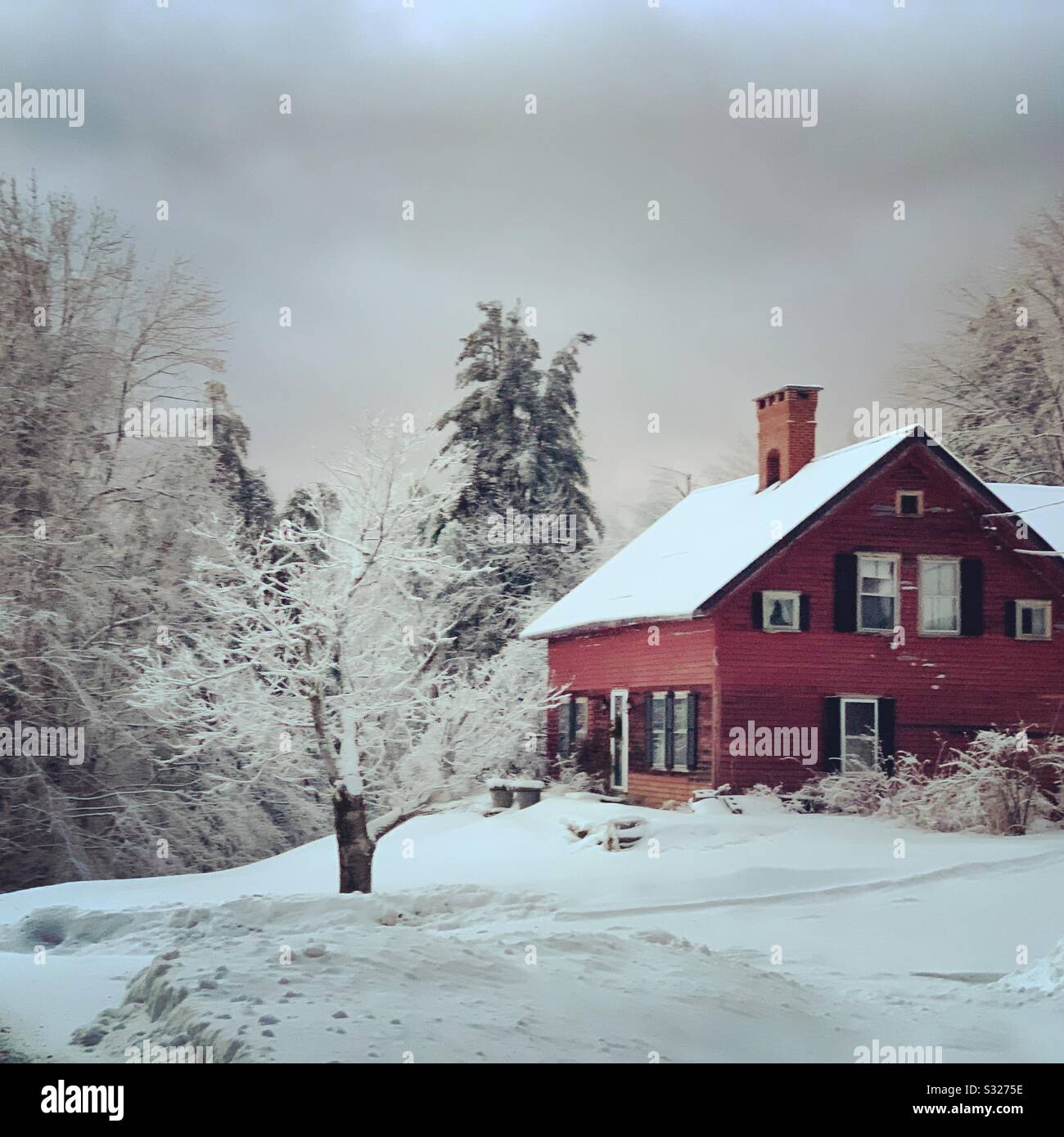 A red house in a winter landscape, Hawley, Massachusetts, United States - Smartphone Captured Stock Image
