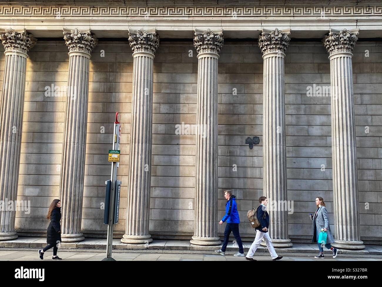People walk past the Bank of England in London, January 2020 - Smartphone Captured Stock Image