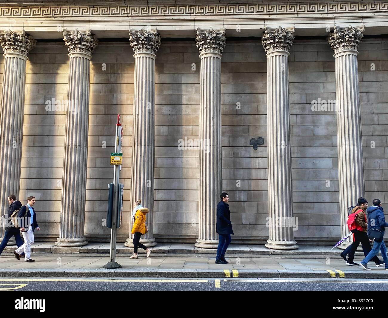 People walk past the Bank of England in London, January 2020 - Smartphone Captured Stock Image