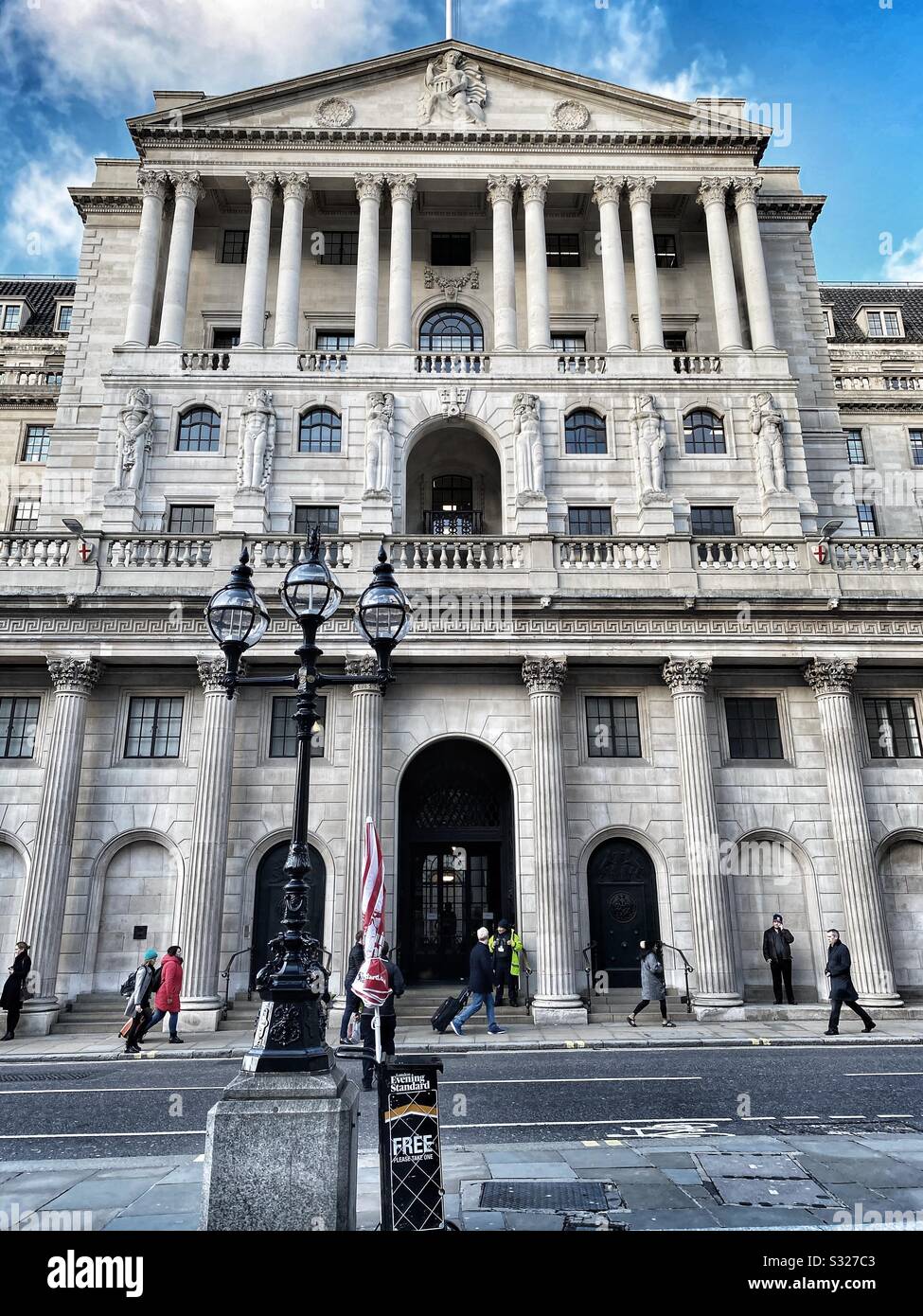 People walk past the Bank of England in London, January 2020 - Smartphone Captured Stock Image