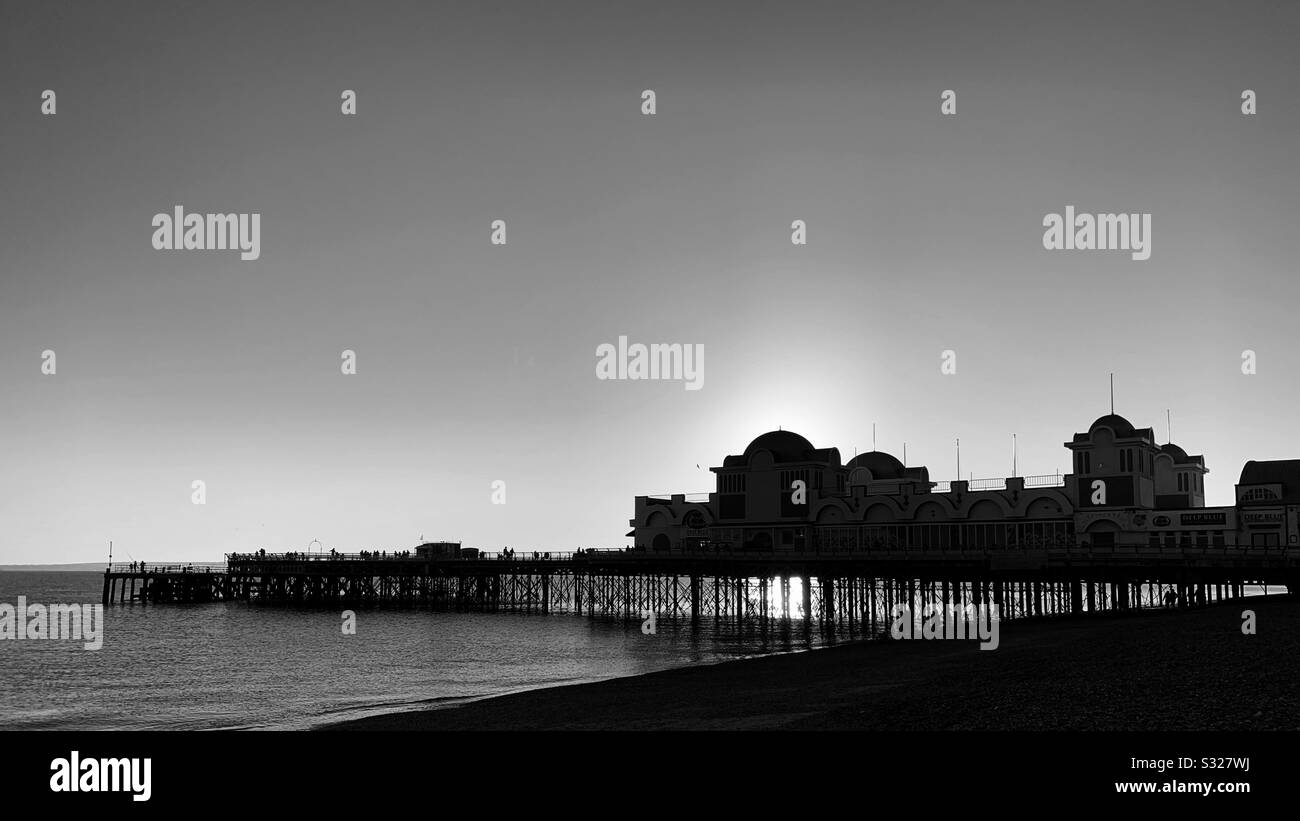 Sun setting behind South Parade Pier in Portsmouth - Smartphone Captured Stock Image