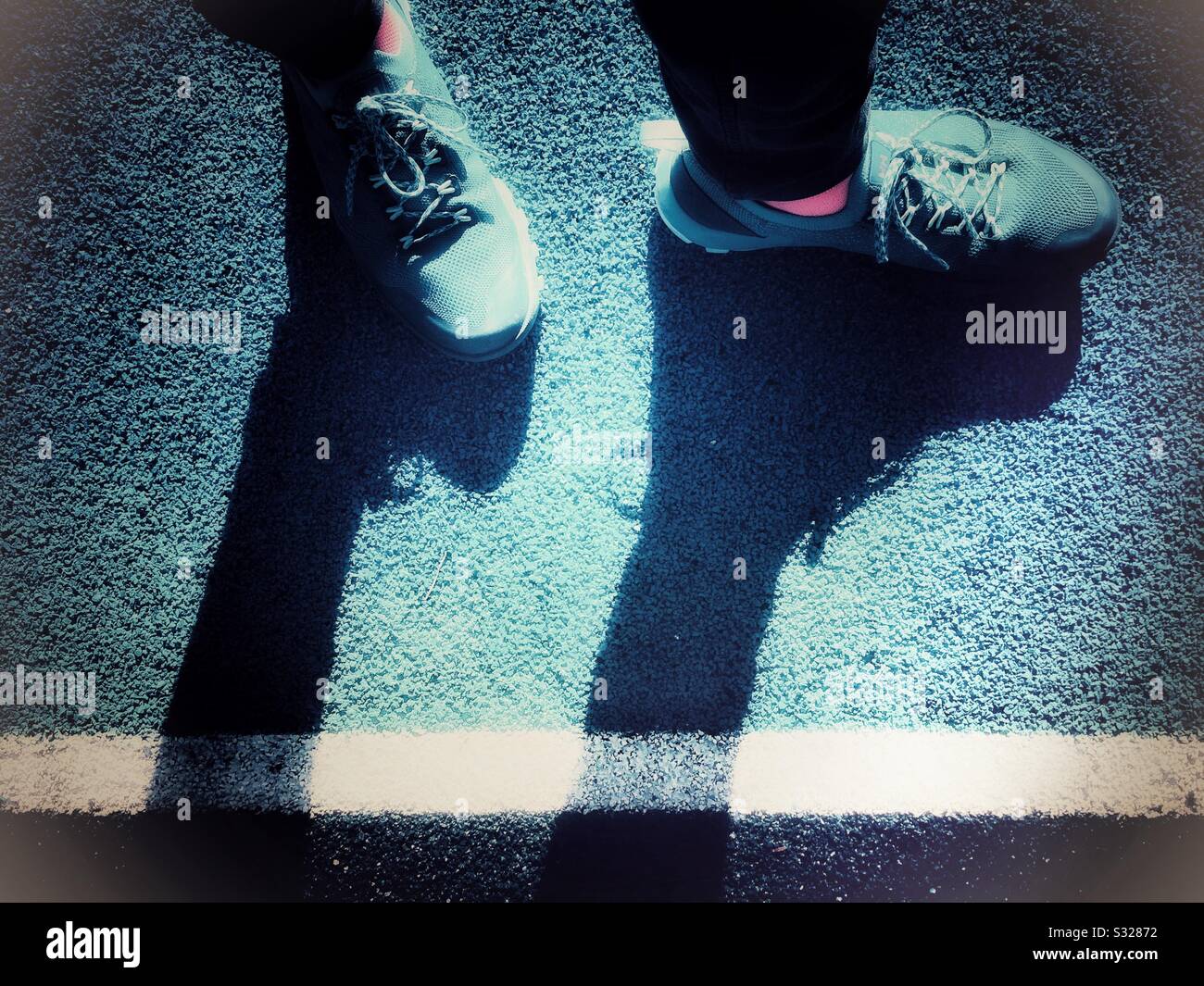 Pedestrian feet shadow - Smartphone Captured Stock Image