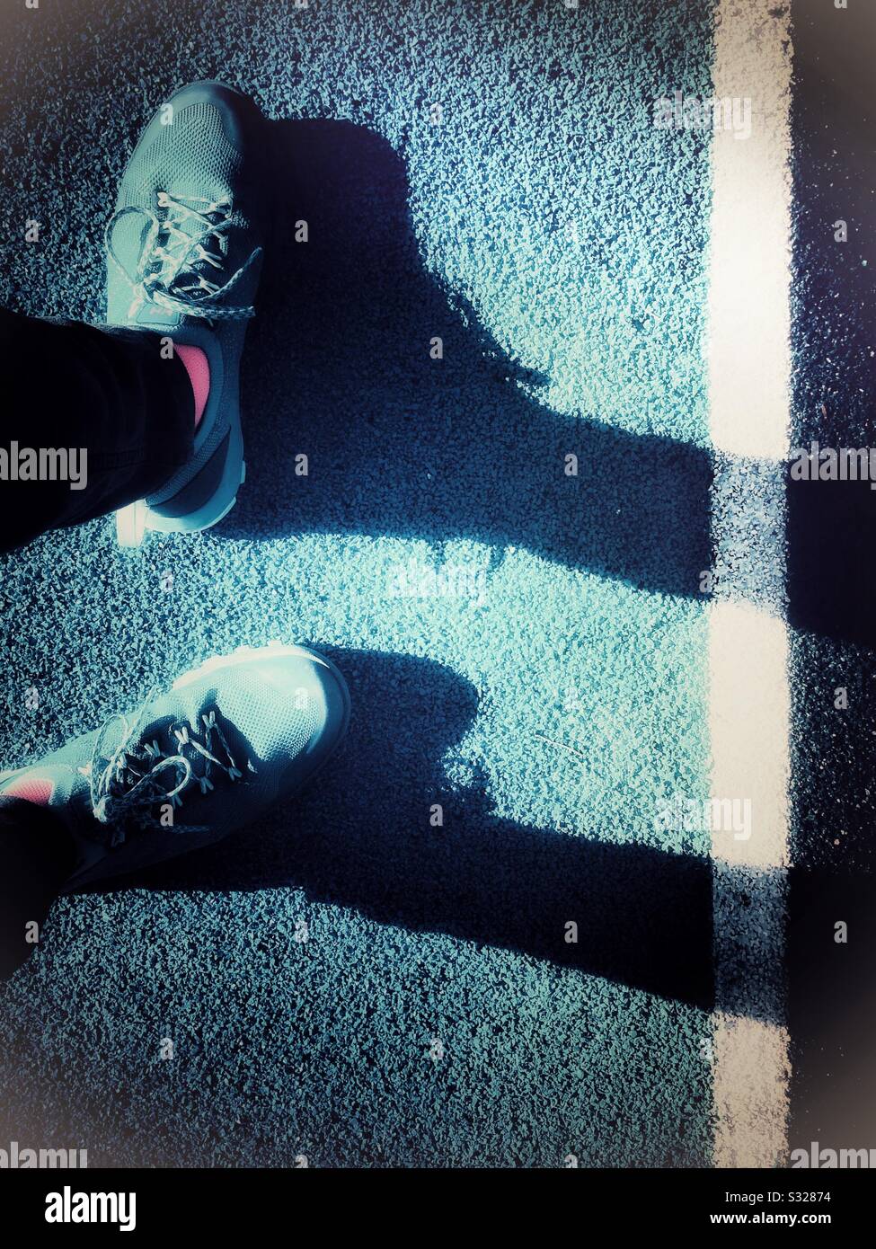 Pedestrian feet shadow - Smartphone Captured Stock Image