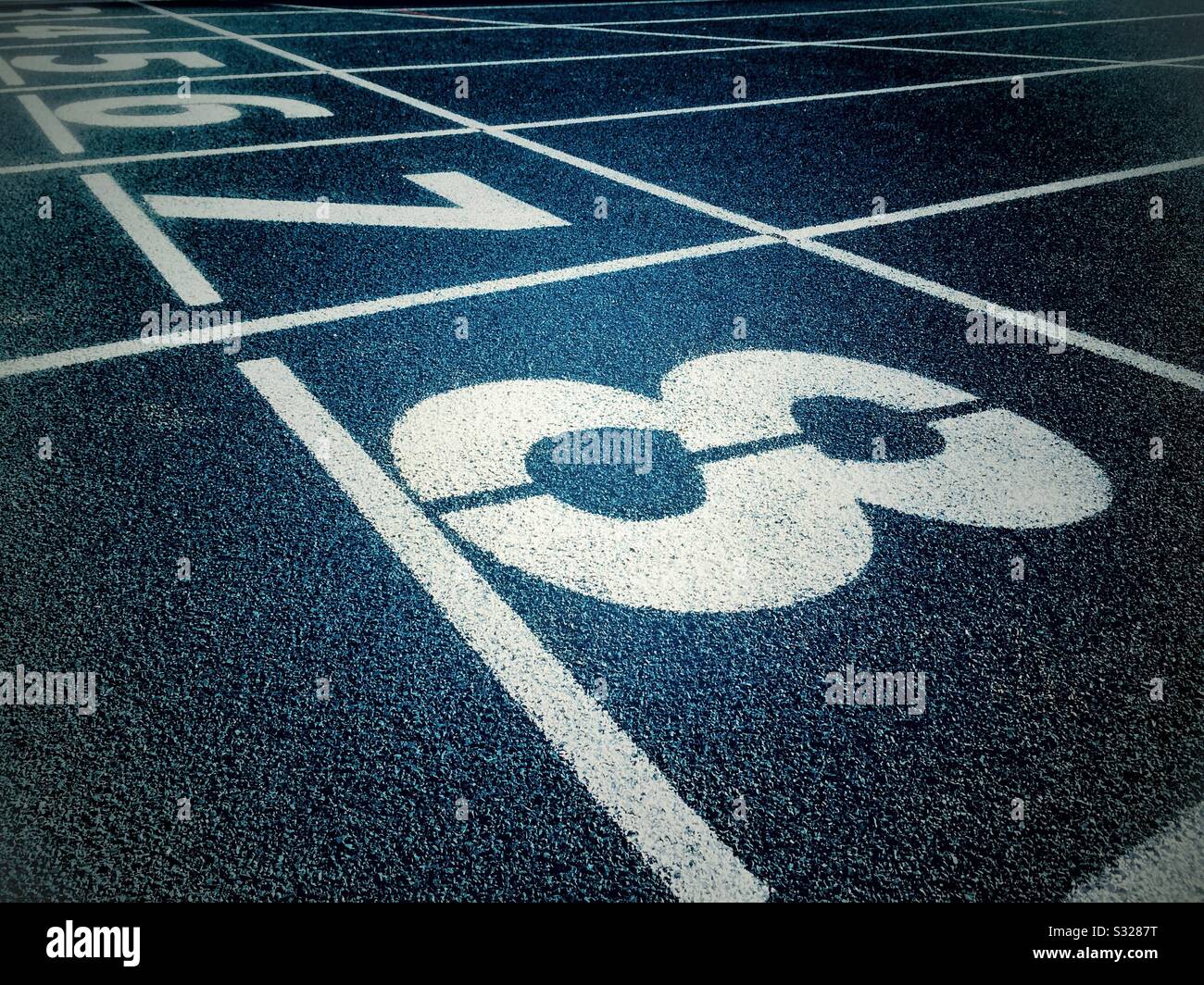 Marking and numbers on a running track Stock Photo