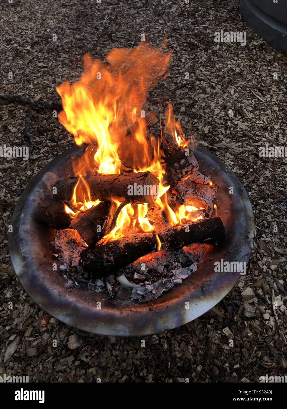 Fire burning in fire pit Stock Photo Alamy