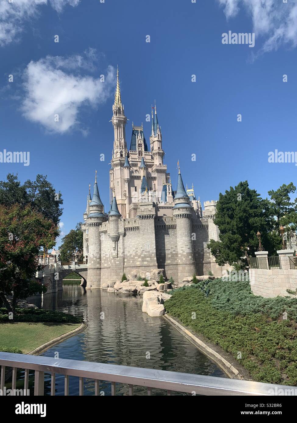 Disney castle with blue sky and clouds Stock Photo