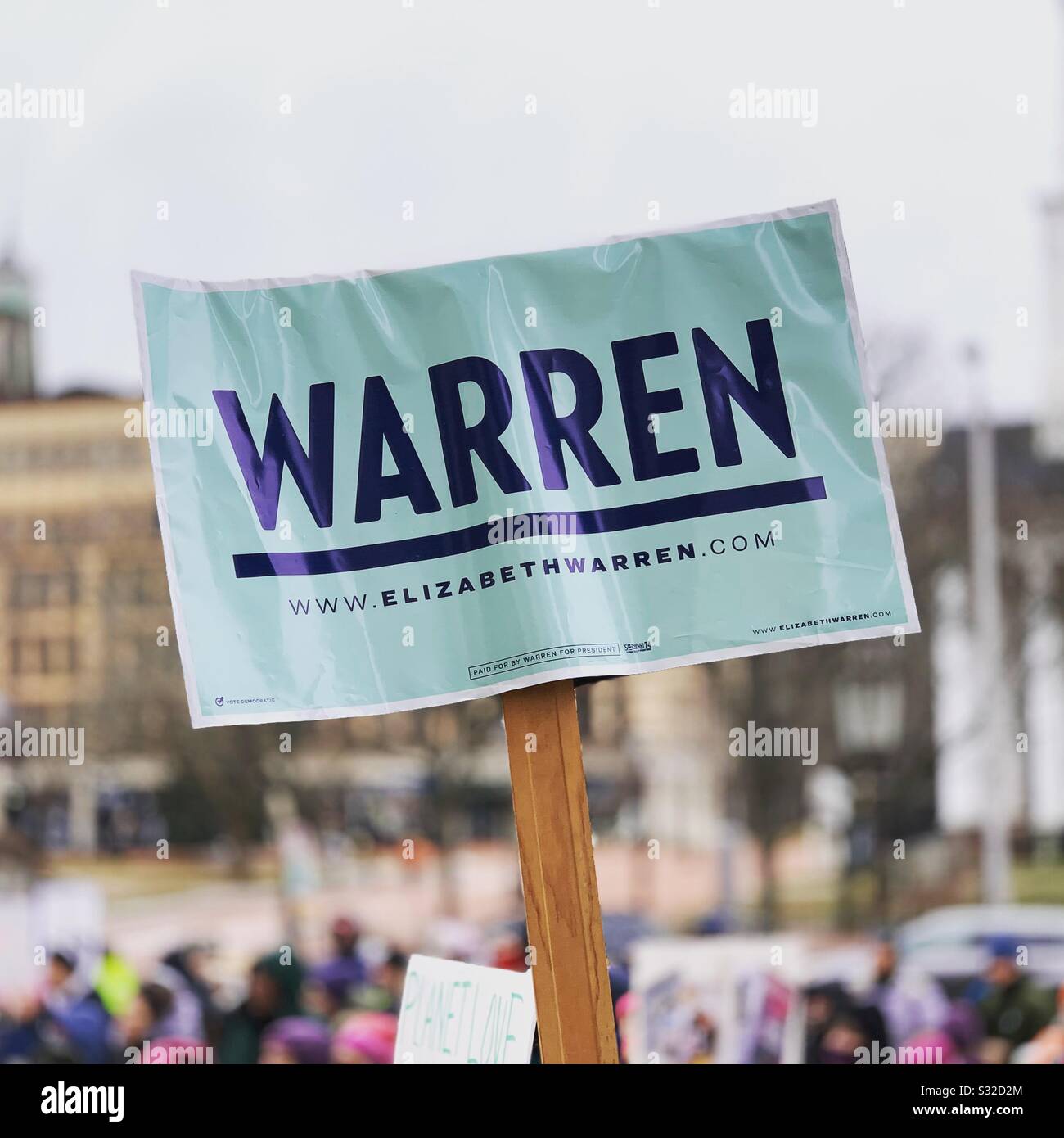 January 18, 2020. Springfield, Massachusetts, USA. A sign promoting Democratic Presidential Candidate Elizabeth Warren is held by a participant at the Pioneer Valley Women’s March - Smartphone Captured Stock Image