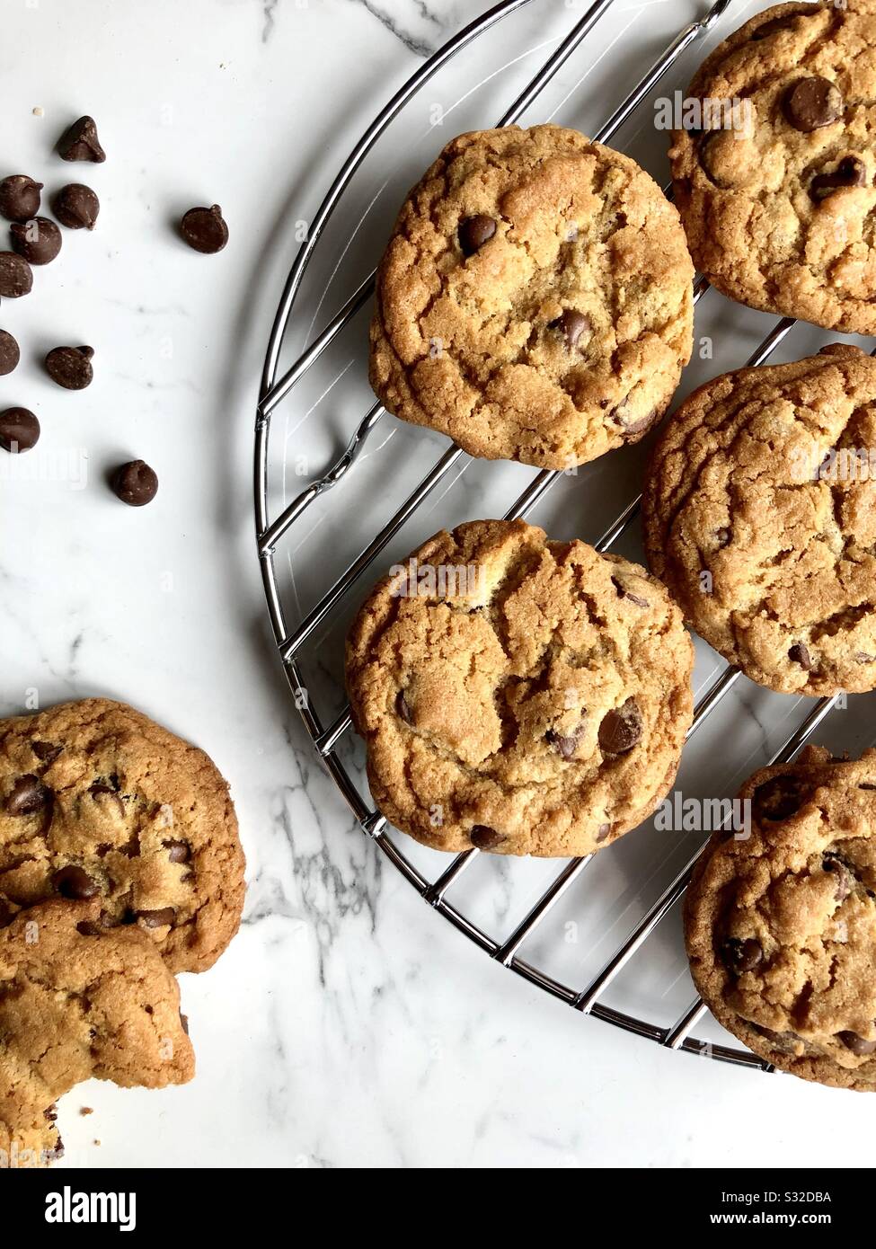 Chocolate chip cookies on a wire cooling rack Stock Photo