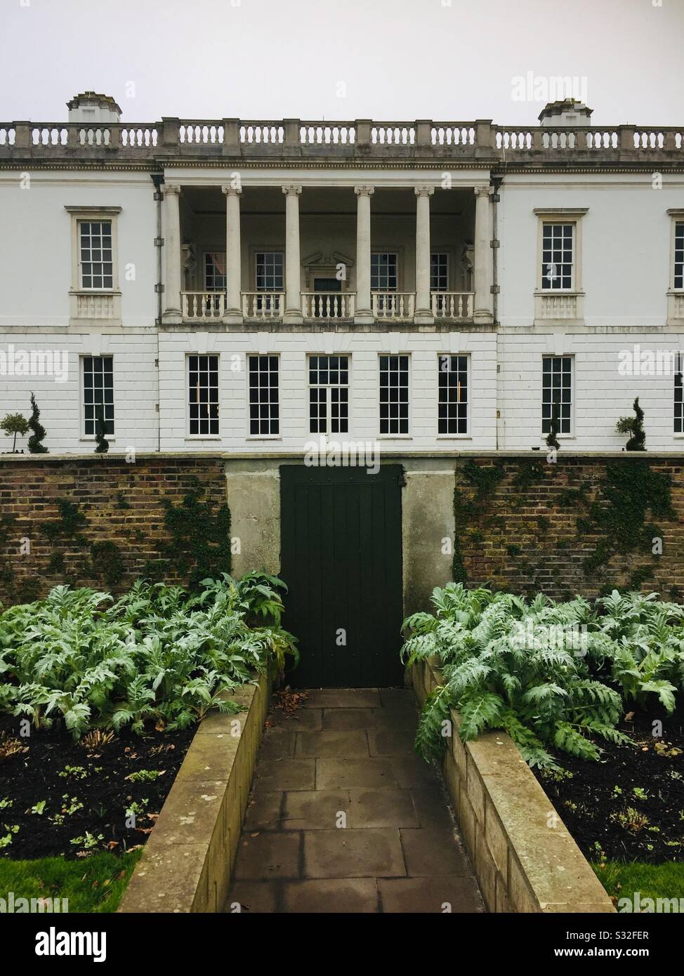 The queens house Greenwich in January 2020 showing great architecture line doorway path columns White House England - Smartphone Captured Stock Image