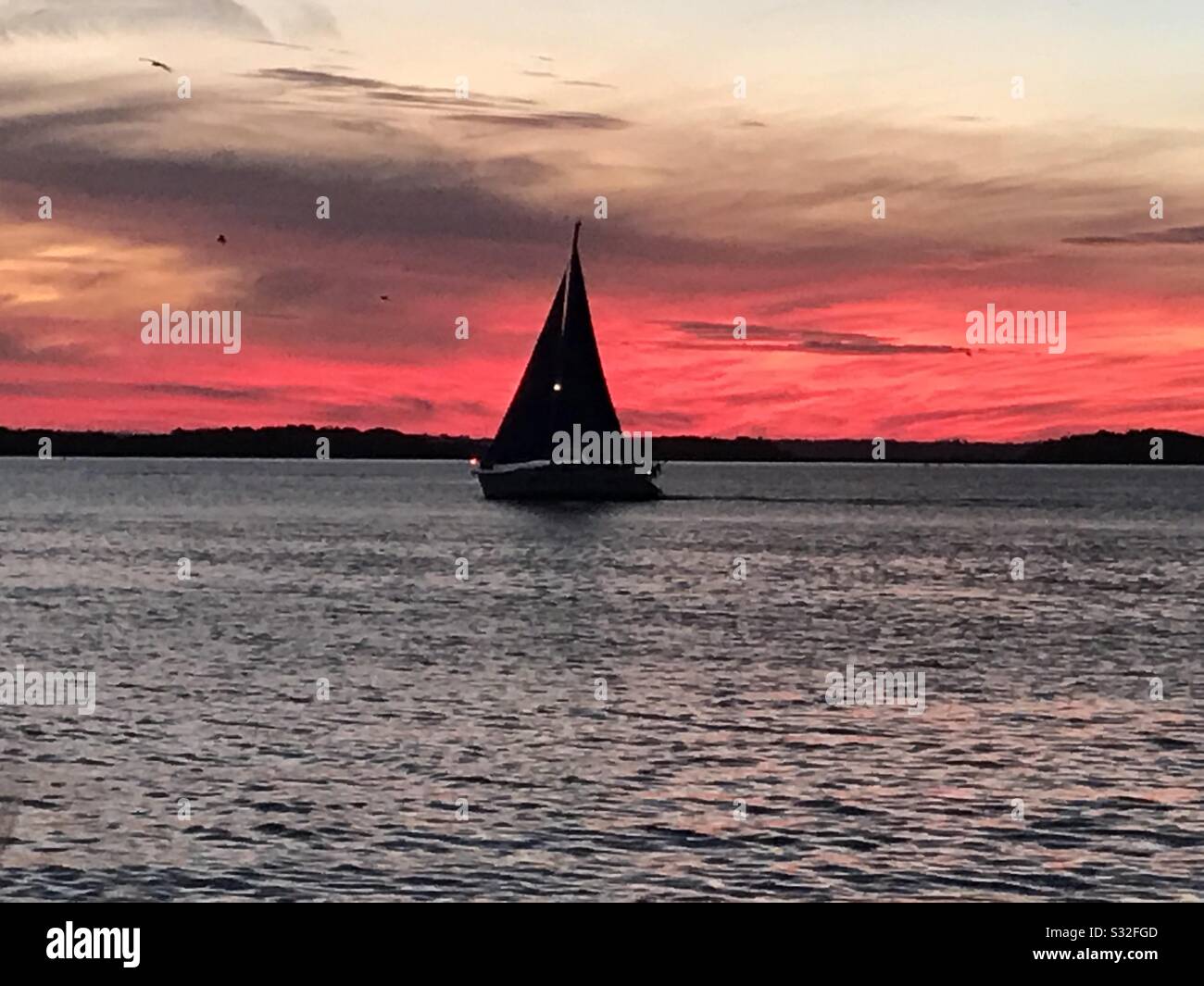 Sunset sailing, Amelia Island Stock Photo
