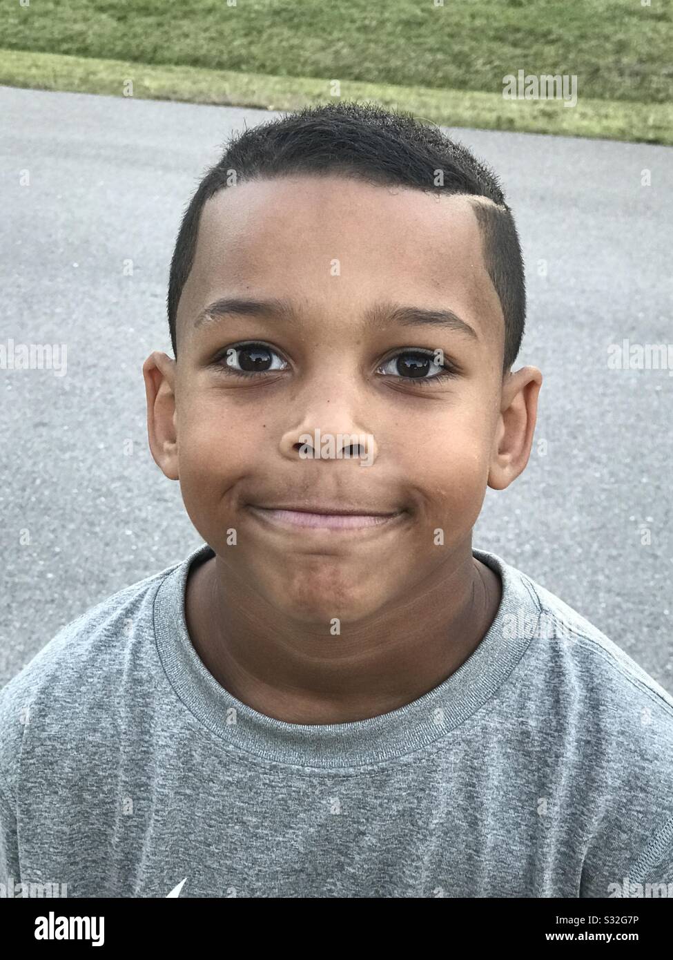 Little boy making a silly face Stock Photo