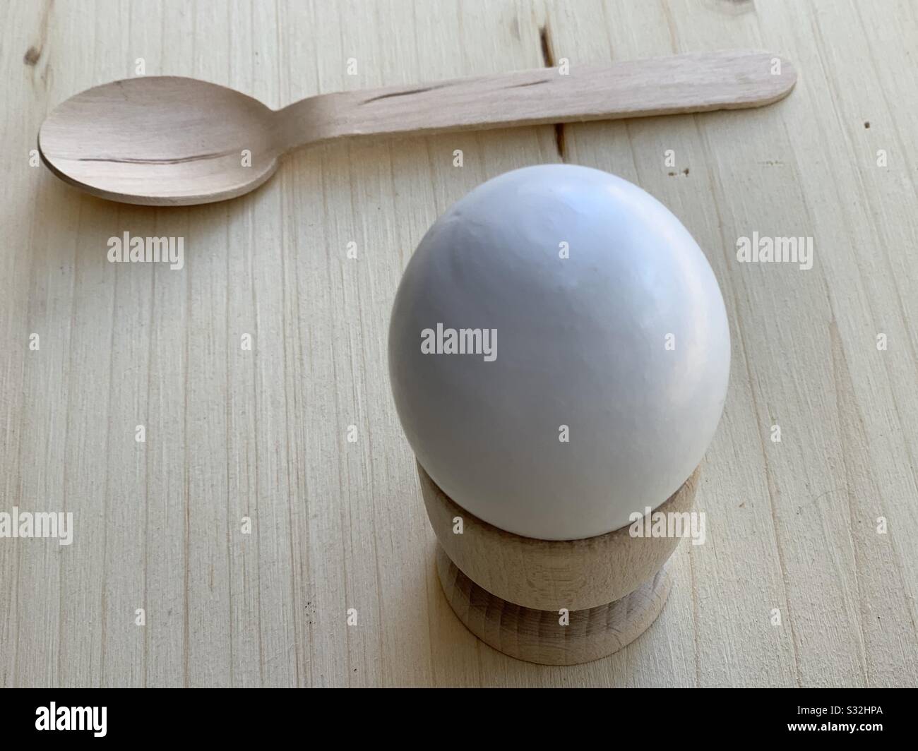 Soft-boiled egg, oef à la coque with a wooden spoon - Smartphone Captured Stock Image