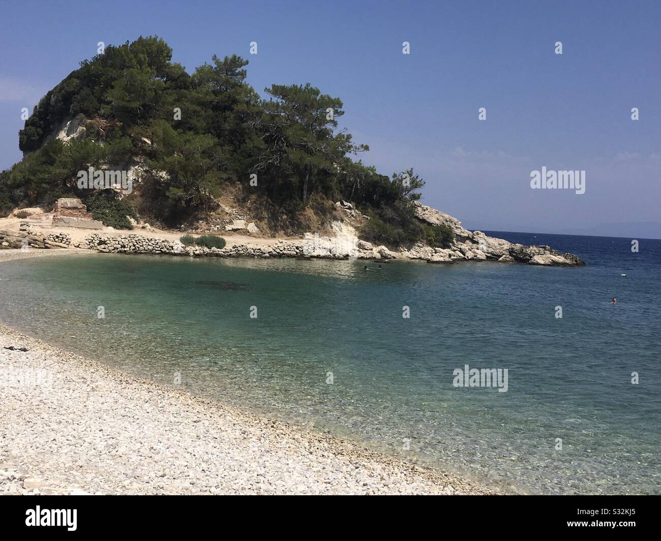 Rocky outcroft taken from the beach in Kokkari on the Greek Island of Samos. Taken 20th July 2018. Stock Photo
