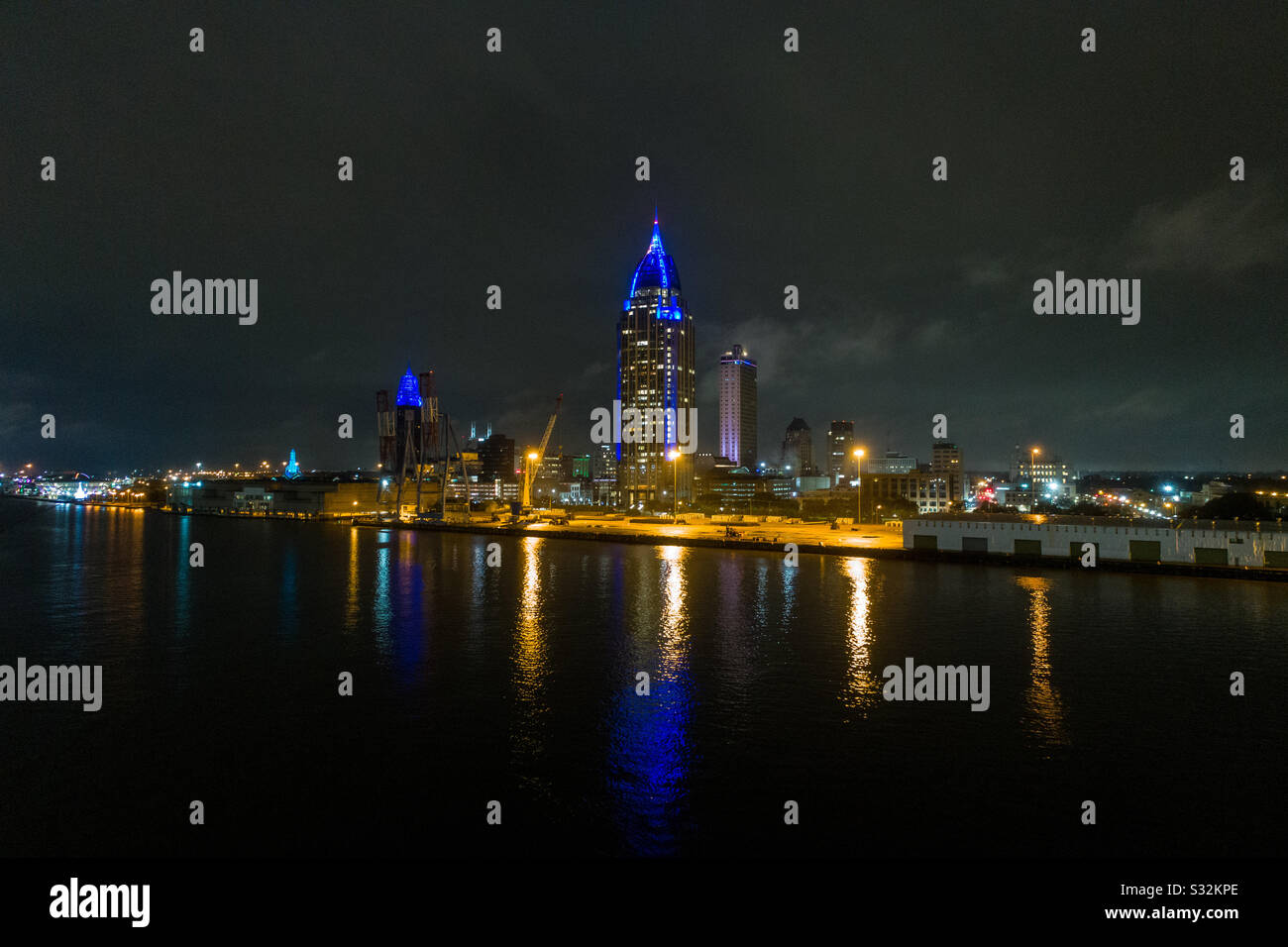 Downtown Mobile, Alabama riverside at night - Smartphone Captured Stock Image