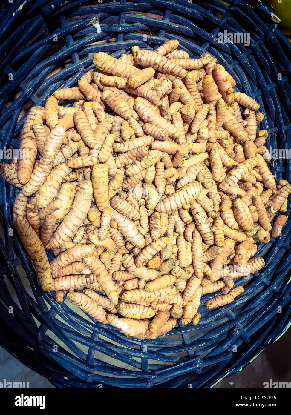 Organic turmeric in a basket Stock Photo
