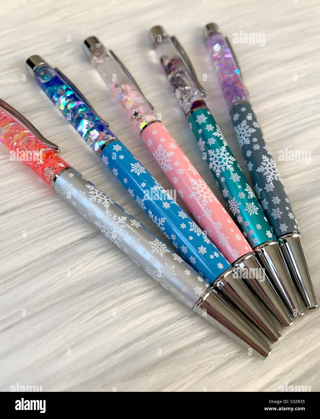 Floating Glitter Pens Stock Photo