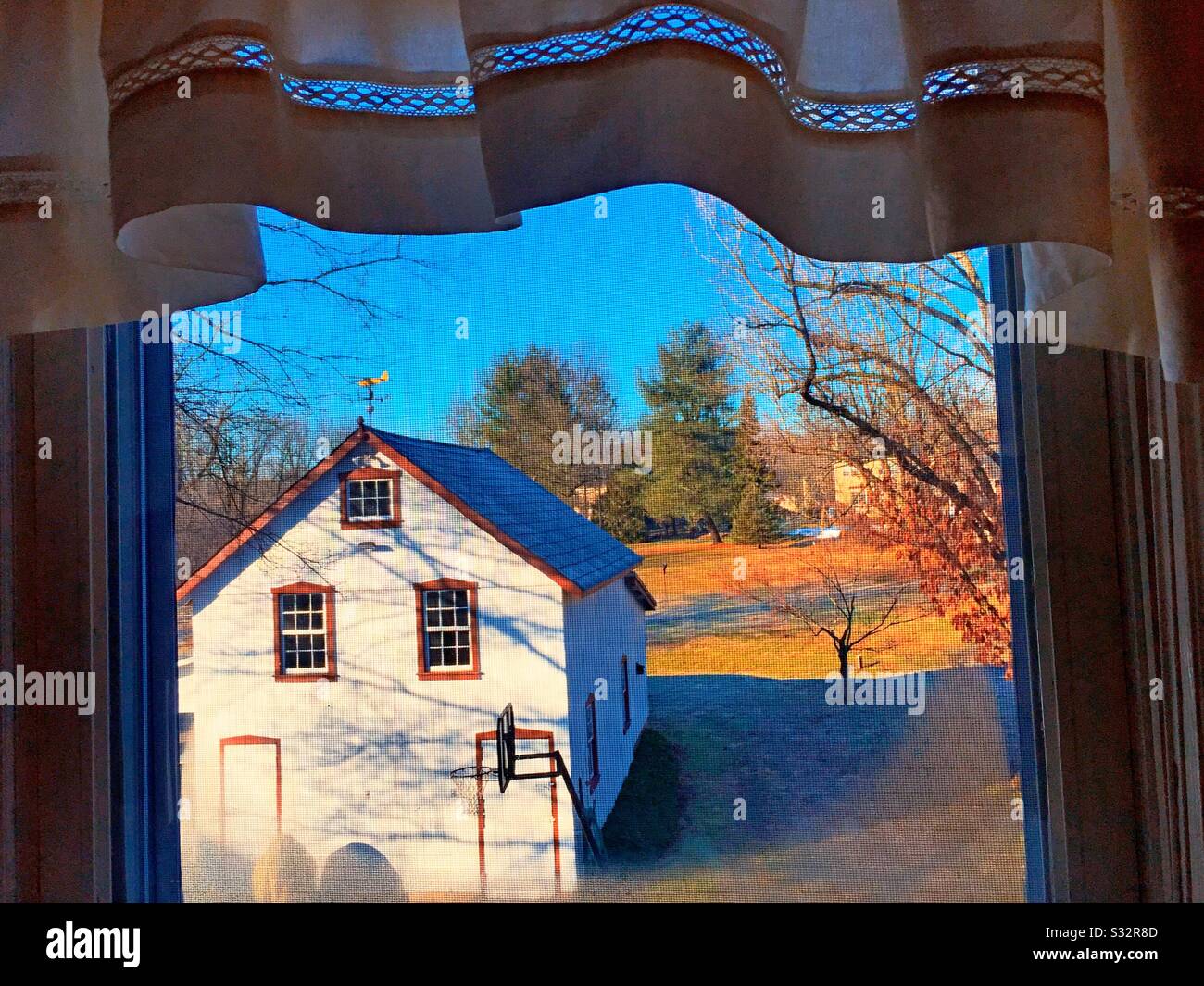 Pennsylvania barn looking out on the field of the farm from the
