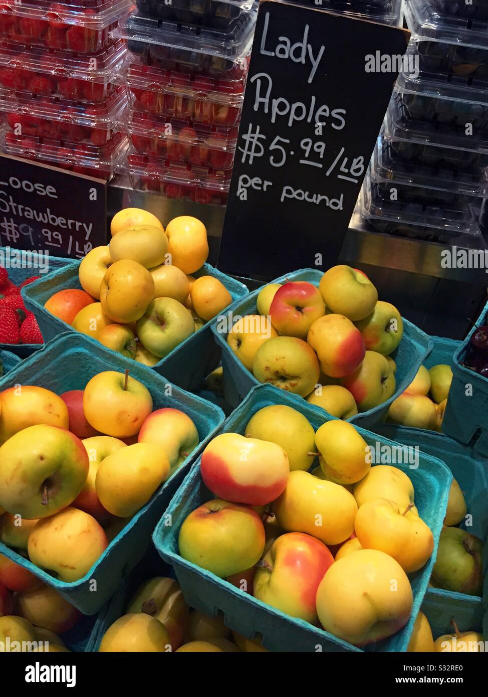 Lady apples for sale in the produce aisle of the grocery store for 5.