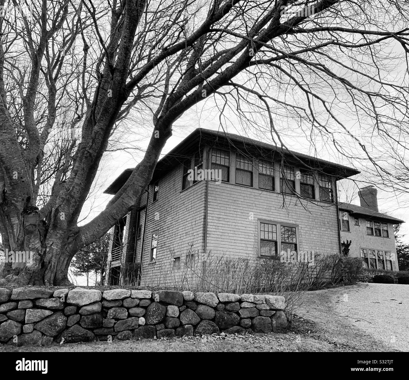 Black and white winter image of a home in Woods Hole, Falmouth, Cape Cod, Massachusetts, United States - Smartphone Captured Stock Image