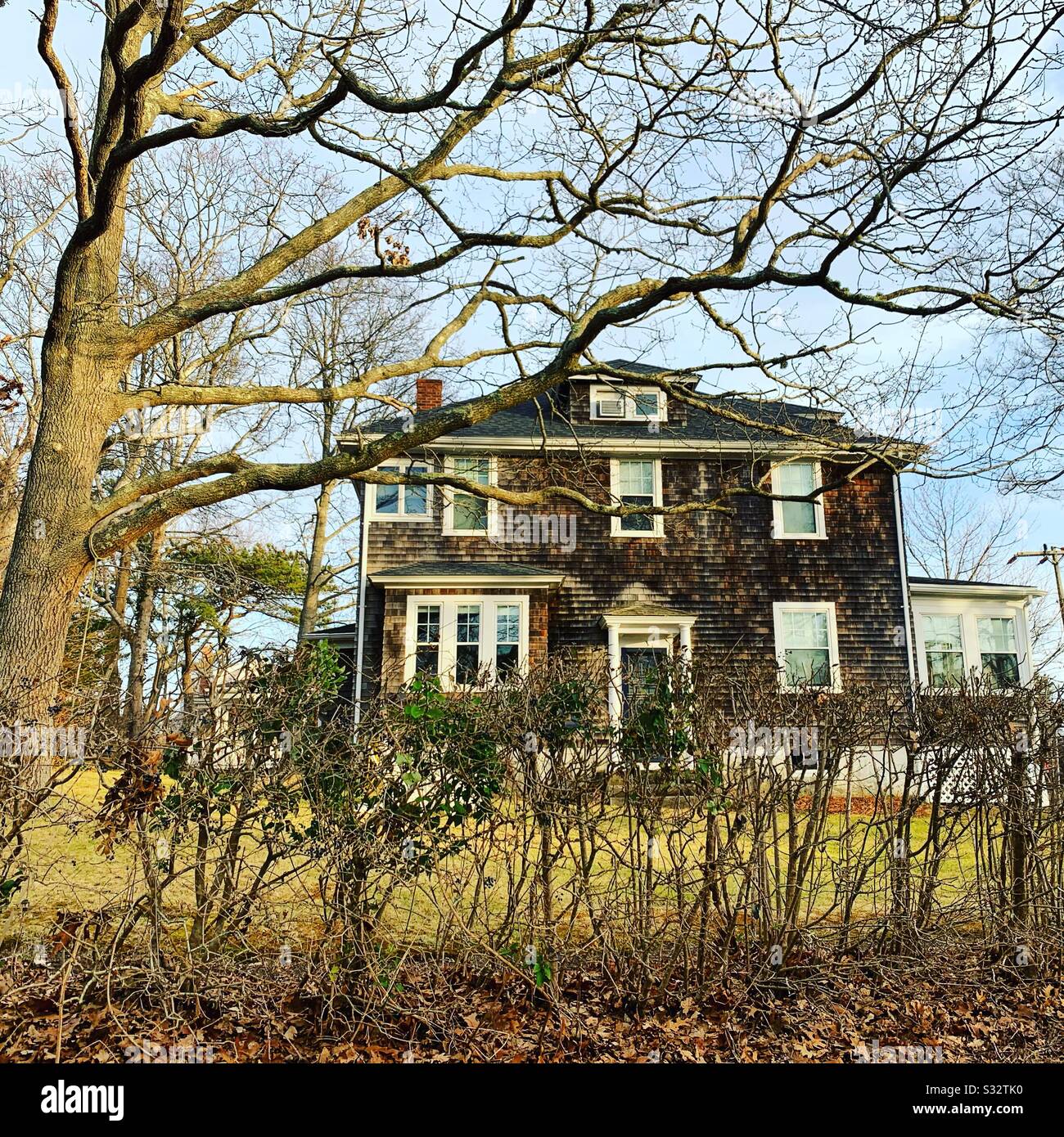 Winter view of a home in Woods Hole, Falmouth, Cape Cod, Massachusetts, United States - Smartphone Captured Stock Image