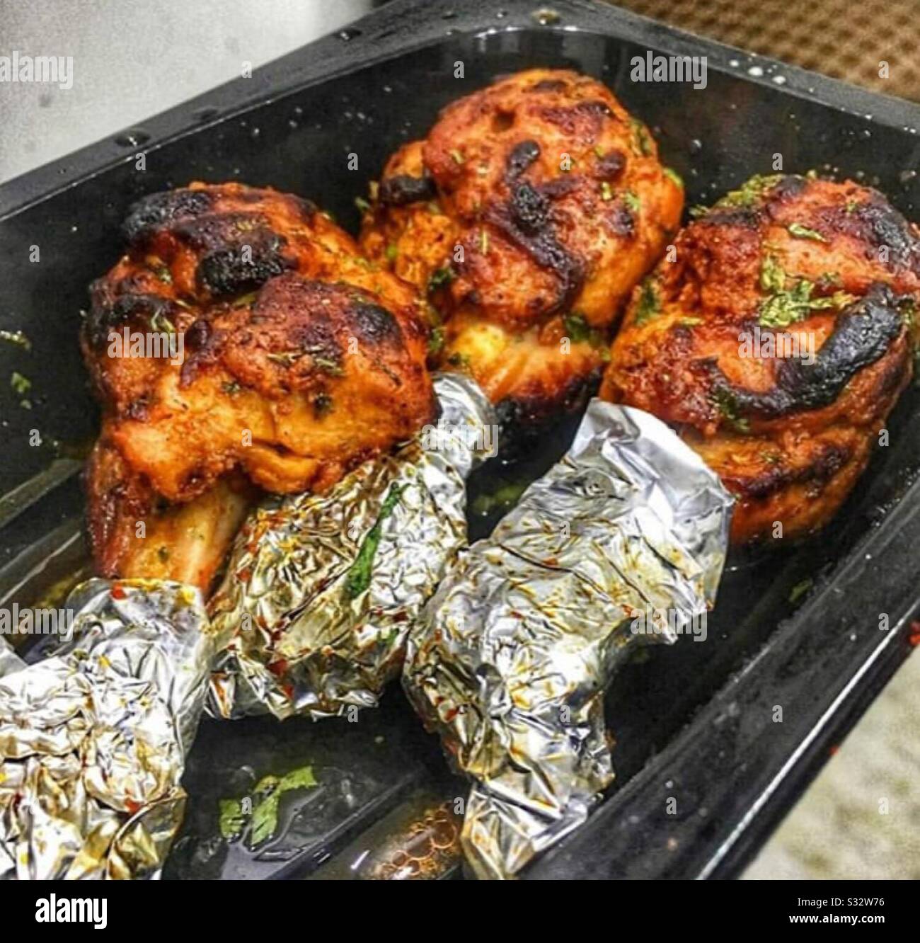 Spicy Indian tandoori chicken starter dish Stock Photo