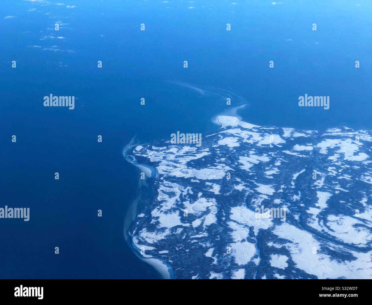 Anticosti Island (Île d’Anticosti) in the Gulf of Saint Lawrence, Quebec, Canada from an airplane window - Smartphone Captured Stock Image