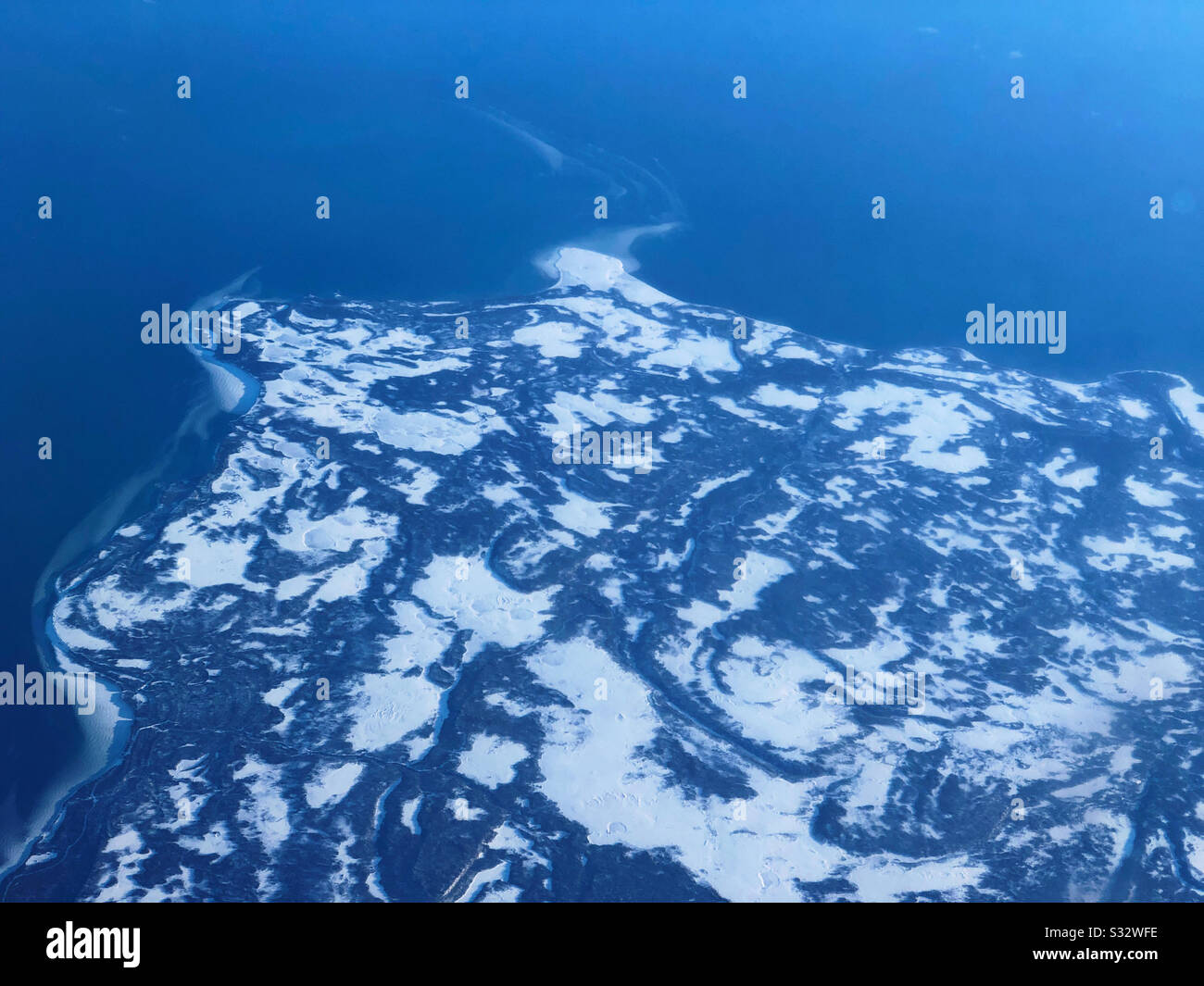Anticosti Island (Île d’Anticosti) in the Gulf of Saint Lawrence, Quebec, Canada from an airplane window - Smartphone Captured Stock Image
